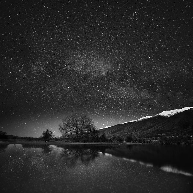Between TWO Worlds by Vassilis Tangoulis